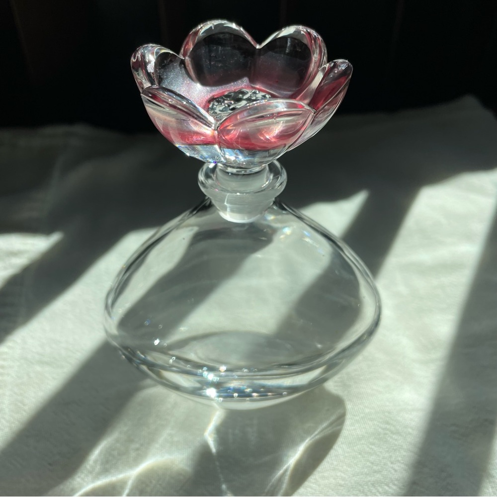 Vintage empty clear glass perfume bottle with pink glass stopper